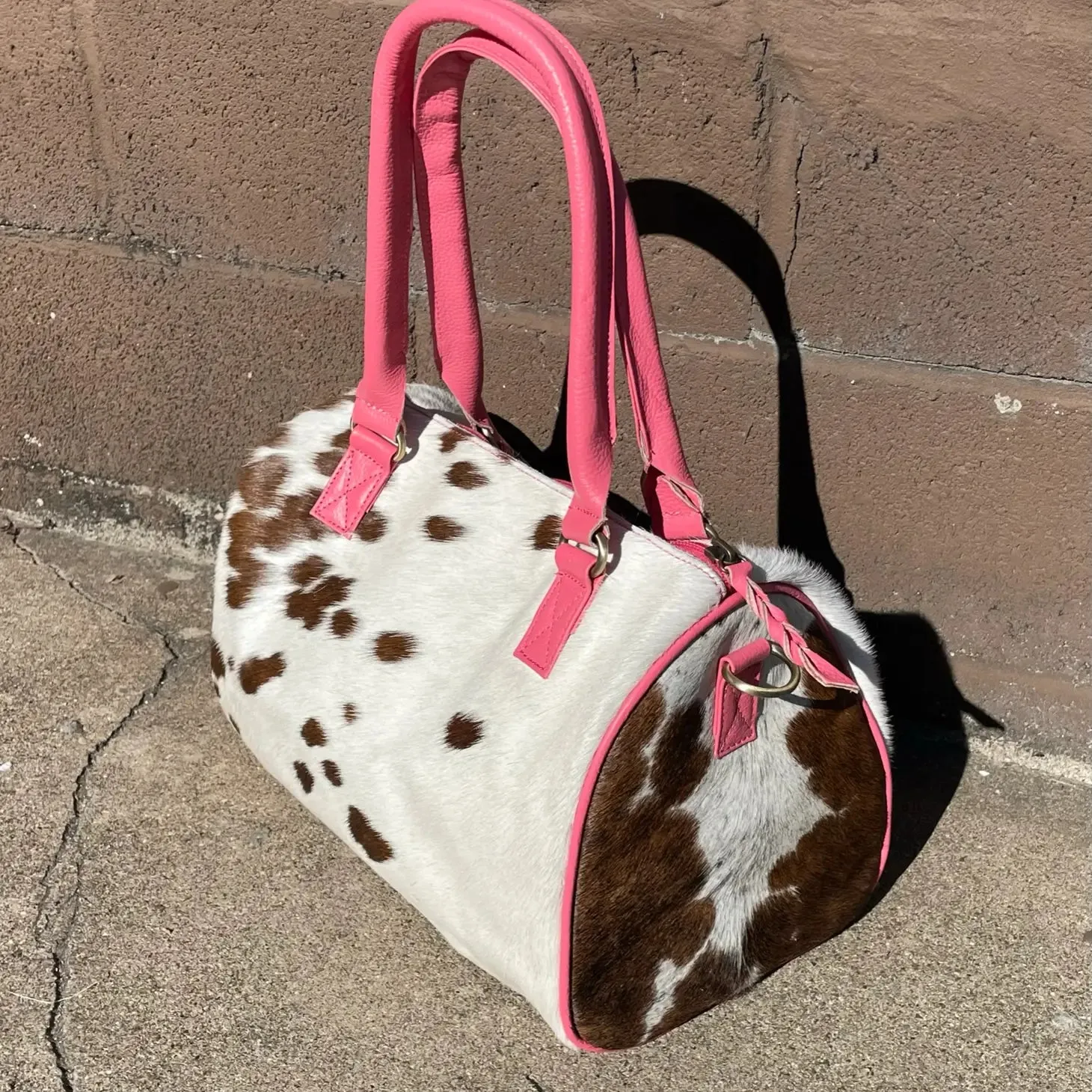 Cowhide Speedy Leather Bag with Pink Detail